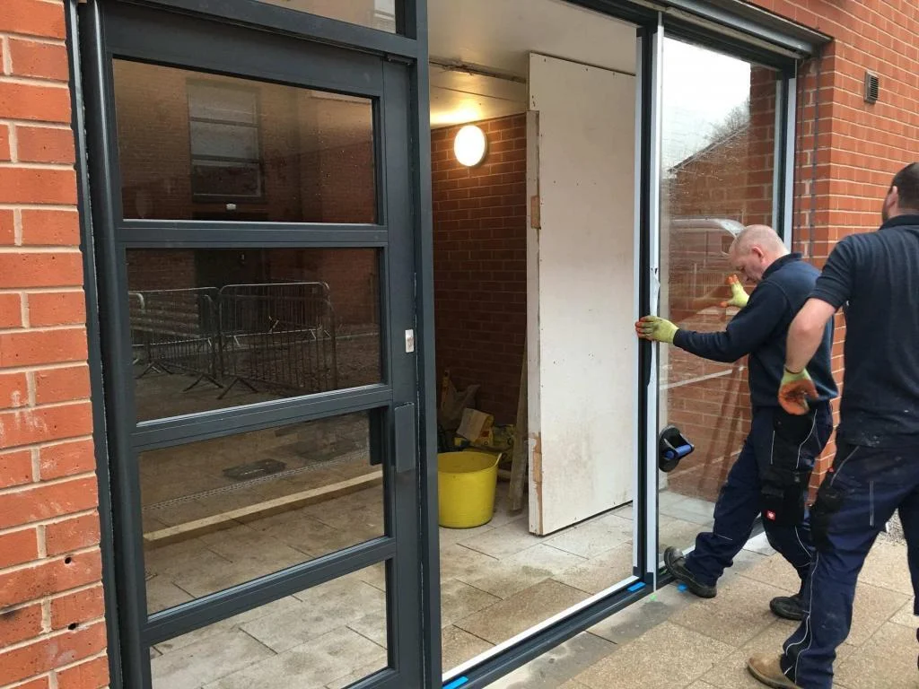 Installation of Aluminium Doors by Combat Doors Ltd Aluminium Door Installation