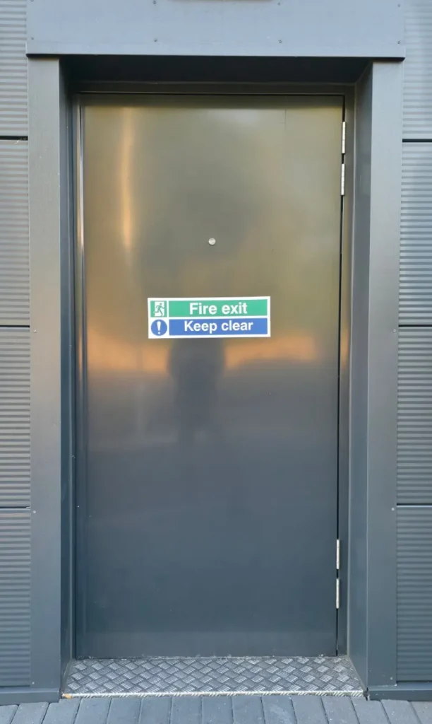 Insulated Industrial Loading Bay Roller Shutter Defender T1F steel fire rated emergency exit door
